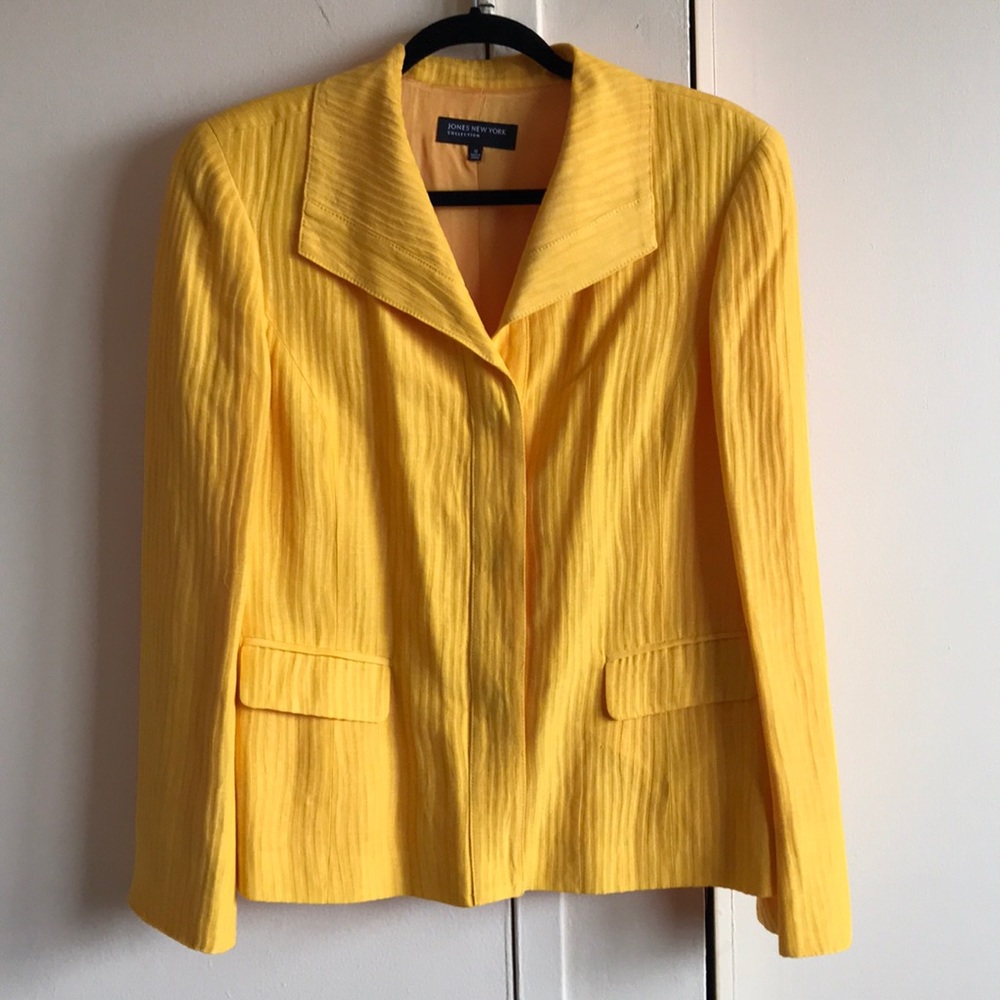 A yellow suit top